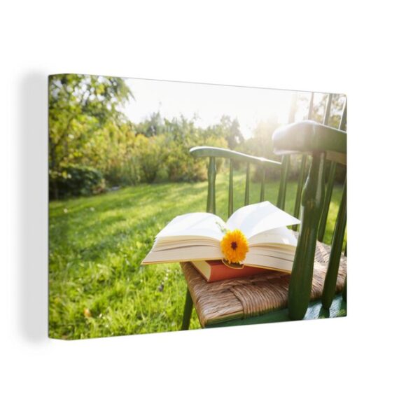 OneMillionCanvasses® Leinwandbild Stuhl mit Buch im Garten, (1 St), Leinwand Bilder Klein, Wand Dekoration Aesthetic 30x20 cm